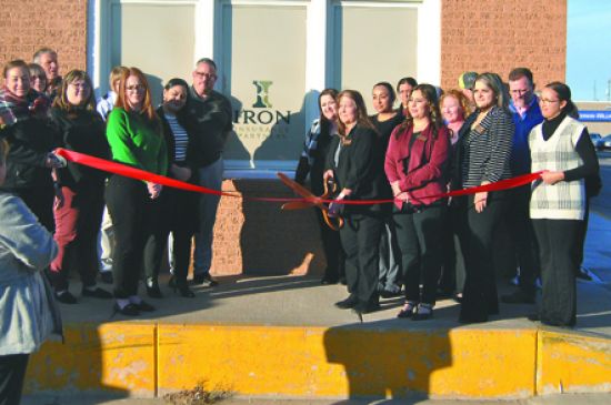 After purchasing Al Shank Insurance, Iron Insurance cuts ribbon